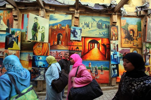 a smal Marketroad in the Medina of old City in the historical town of Fes in Morocco in north Africa.