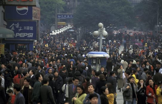 People at the main square in the city of Chongqing in the province of Sichuan in china in east asia.