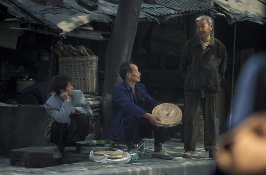 people on the Market streets of Chongqing in the province of Sichuan in china in east asia.
