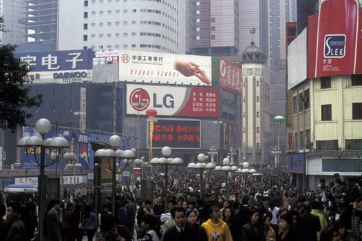 People at the main square in the city of Chongqing in the province of Sichuan in china in east asia.