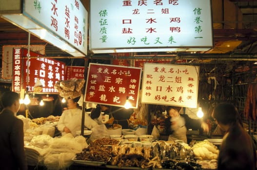 people on the Market streets of Chongqing in the province of Sichuan in china in east asia.