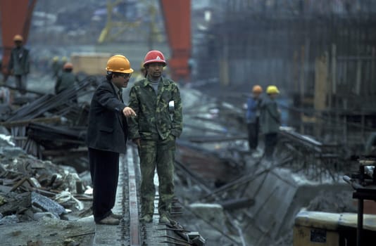 the constructions work at the three gorges dam project on the yangzi river in the province of hubei in china.