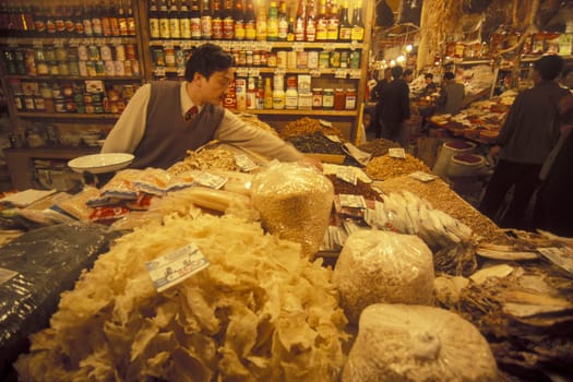 people on the Market streets of Chongqing in the province of Sichuan in china in east asia.