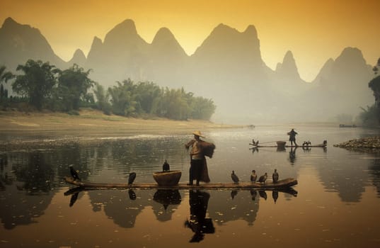 the landscape at the Li River near Yangshou near the city of Guilin in the Province of Guangxi in china in east asia.