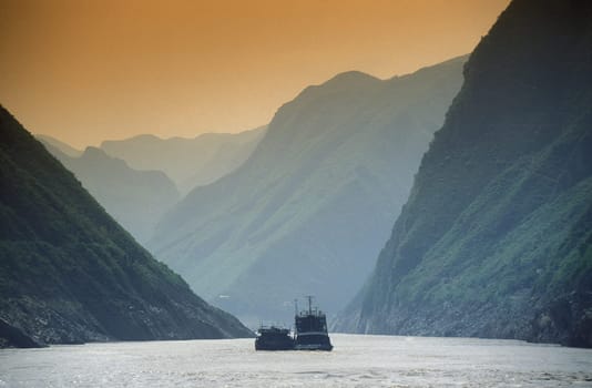 the landscape from a ship on the yangzee river in the three gorges valley up of the three gorges dam projecz in the province of hubei in china.