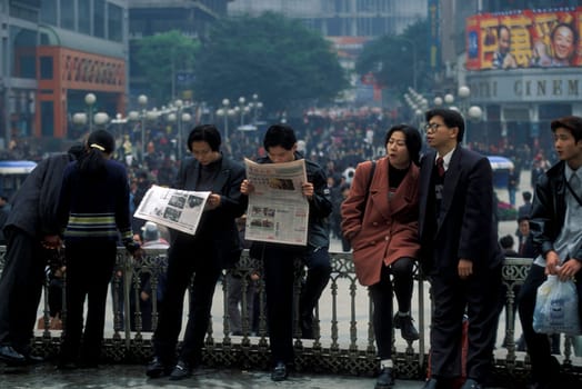 People at the main square in the city of Chongqing in the province of Sichuan in china in east asia.