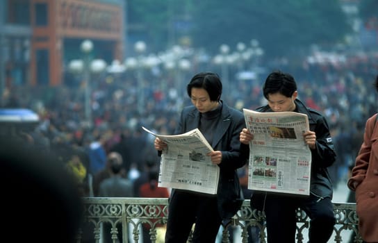 People at the main square in the city of Chongqing in the province of Sichuan in china in east asia.