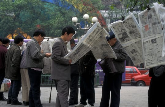People at the main square in the city of Chongqing in the province of Sichuan in china in east asia.