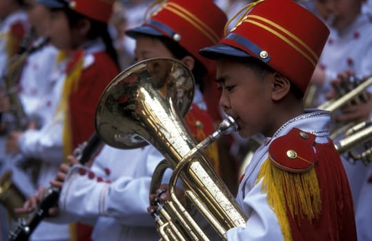 a child music band in the city of wushan on the yangzee river near the three gorges valley up of the three gorges dam project in the province of hubei in china.