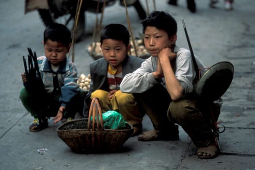 a young worker in the city of wushan on the yangzee river near the three gorges valley up of the three gorges dam project in the province of hubei in china.