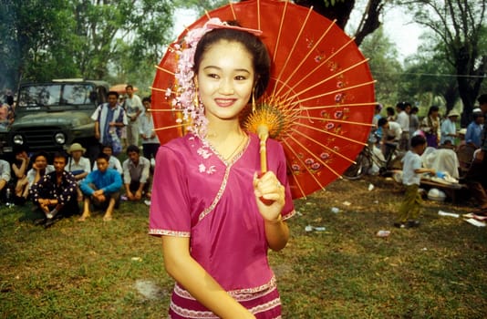 traditional dance at the spring and water festival near Jinghong in the region of Xishuangbanna in the province of Yunnan in china in east asia.