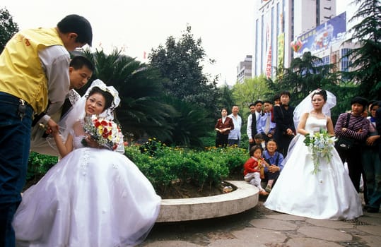 a wedding in the city of wushan on the yangzee river near the three gorges valley up of the three gorges dam project in the province of hubei in china.