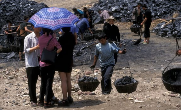 the coal workers in the village of fengjie in the three gorges valley up of the three gorges dam project in the province of hubei in china.
