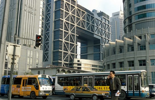 the stock market in the skyline of Pudong in the City of Shanghai in china in east asia.