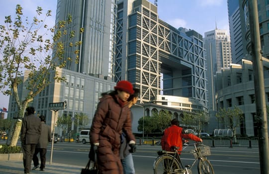 the stock market in the skyline of Pudong in the City of Shanghai in china in east asia.