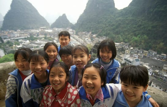 childern at a viewpoint in the landscape at the Li River near Yangshou near the city of Guilin in the Province of Guangxi in china in east asia.