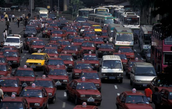 the taxi terminal in the train station in the city of Shenzhen north of Hong Kong in the province of Guangdong in china in east asia.