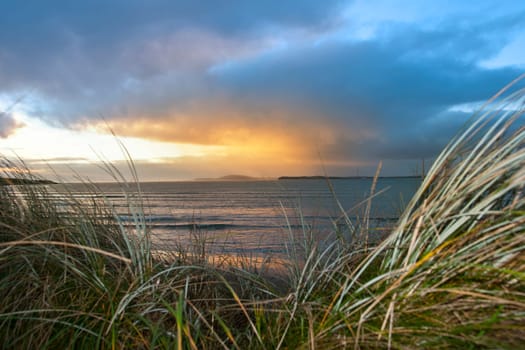 a beautiful view from the sand dunes of Beal beach and sunset in county Kerry Ireland