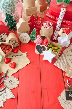 Advent calendar made of small boxes and wraps with sweets