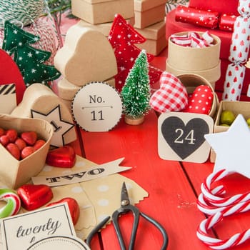 Advent calendar made of small boxes and wraps with sweets