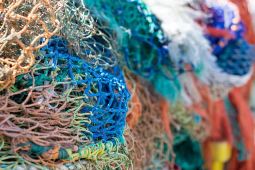 Closeup of a pile of vibrant fishing nets