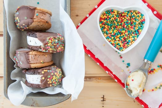 Ice cream sandwich with colorful sprinkles and chocolate