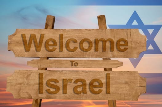 welcome to israel sing on wood background with blending national flag