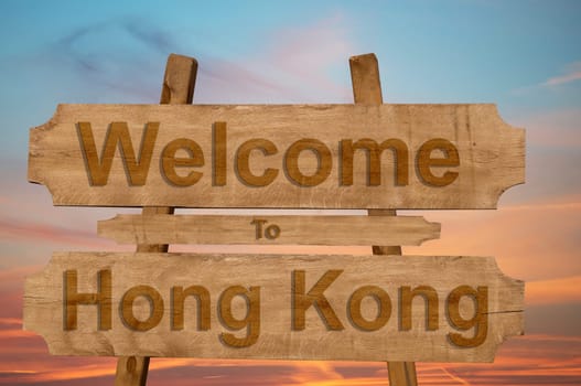 welcome to hong kong sing on wood background