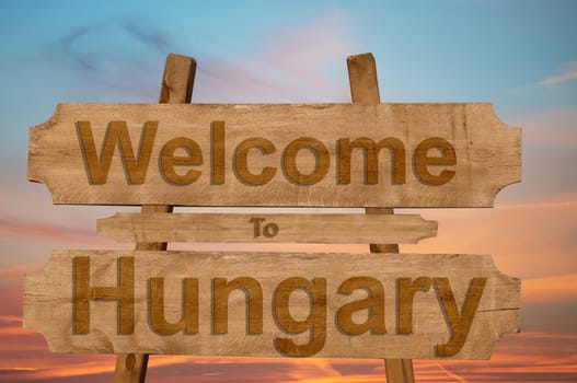 welcome to hungary sing on wood background