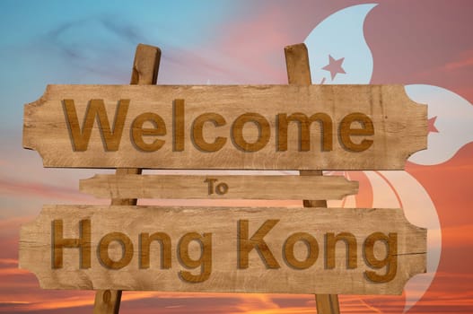welcome to hong kong sing on wood background with blending national flag