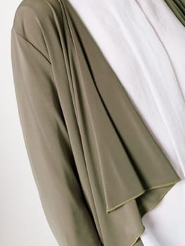 a beautiful model wearing feminine clothes in clear background