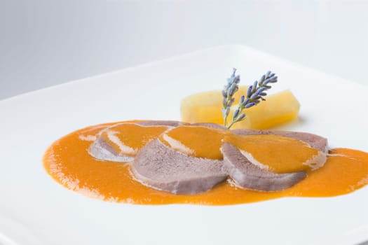 delicious recipe from spain cow meat boiled on a white plate