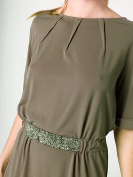 a beautiful model wearing feminine clothes in clear background
