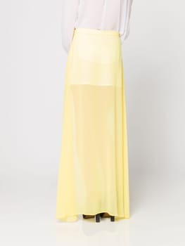 a beautiful model wearing feminine clothes in clear background