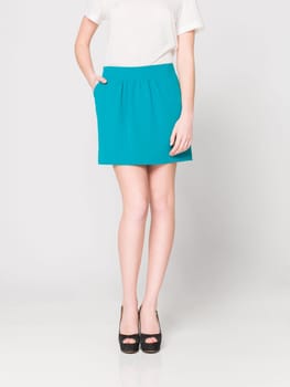 a beautiful model wearing feminine clothes in clear background