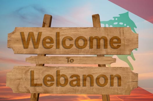 welcome to lebanon sign on wood background with blending national flag