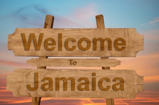 welcome to jamaica sign on wood background