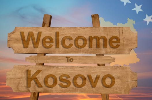 welcome to kosovo sign on wood background with blending national flag