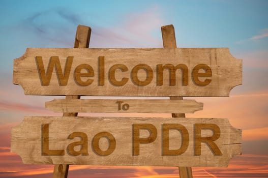 welcome to the lao pdr sign on wood background