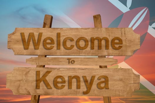welcome to kenya sign on wood background with blending national flag