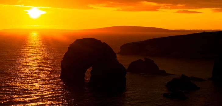 beautiful sunset over the virgin rock and ballybunion coast on the wild atlantic way