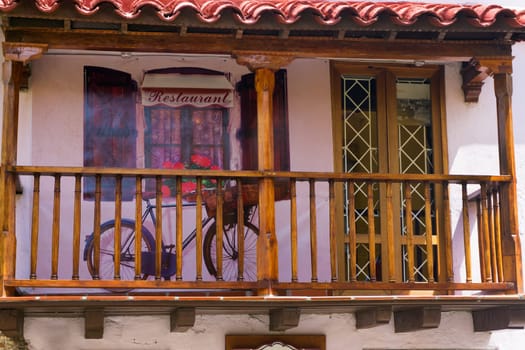 CARTAGENA, COLOMBIA - MAY 23: Balcony of a restaurant with a bicycle on it in Cartagena, Colombia on May 23, 2016