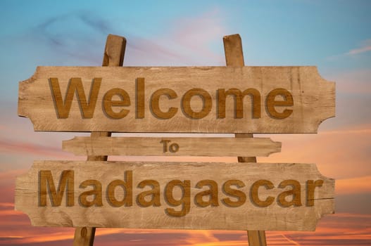welcome to jamaica sign on wood background with blending national flag