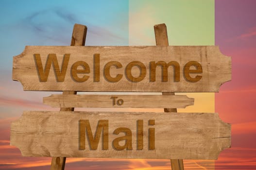 welcome to jamaica sign on wood background with blending national flag