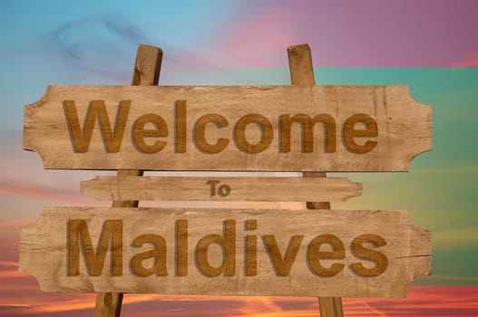 welcome to jamaica sign on wood background with blending national flag