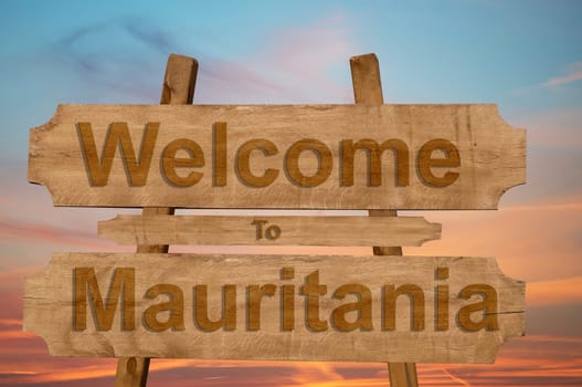welcome to jamaica sign on wood background with blending national flag