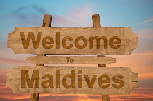 welcome to jamaica sign on wood background with blending national flag