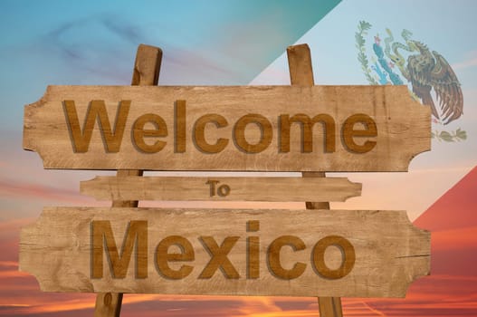 welcome to jamaica sign on wood background with blending national flag