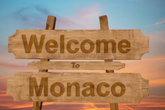 welcome to jamaica sign on wood background with blending national flag