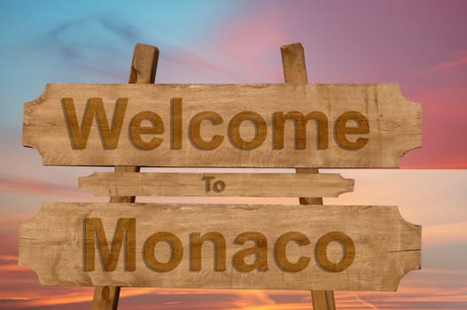 welcome to jamaica sign on wood background with blending national flag